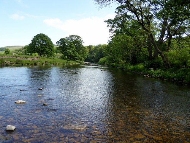 The River Hodder flowing through wooded banks at Whitewell, Forest of Bowland