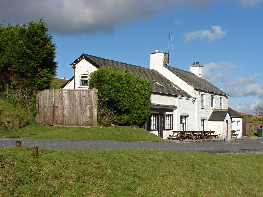 The Warren House Inn, an isolated stone pub on the open moorland of Dartmoor